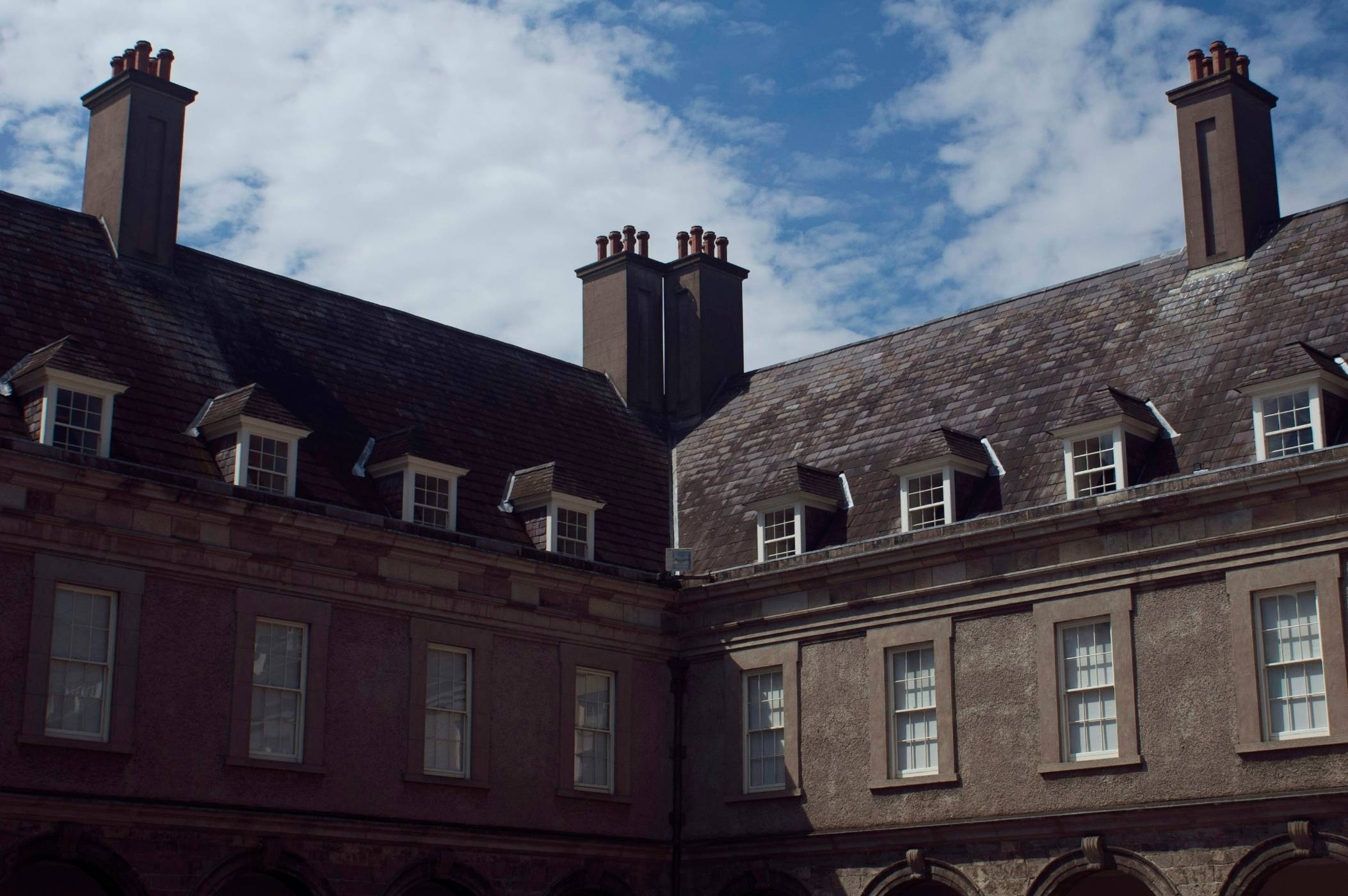 A large building with a clock on the front of it