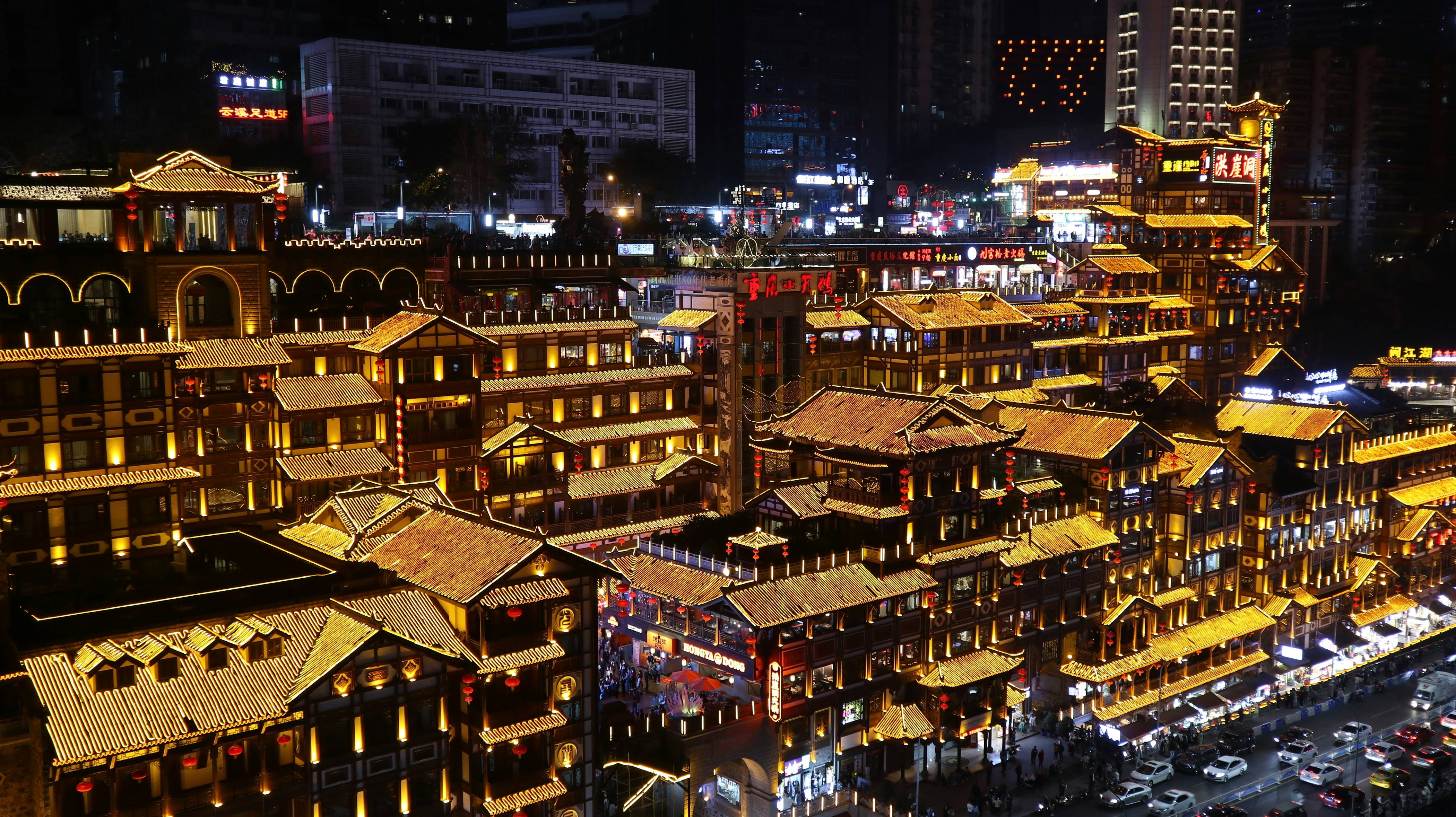 an aerial view of a city at night