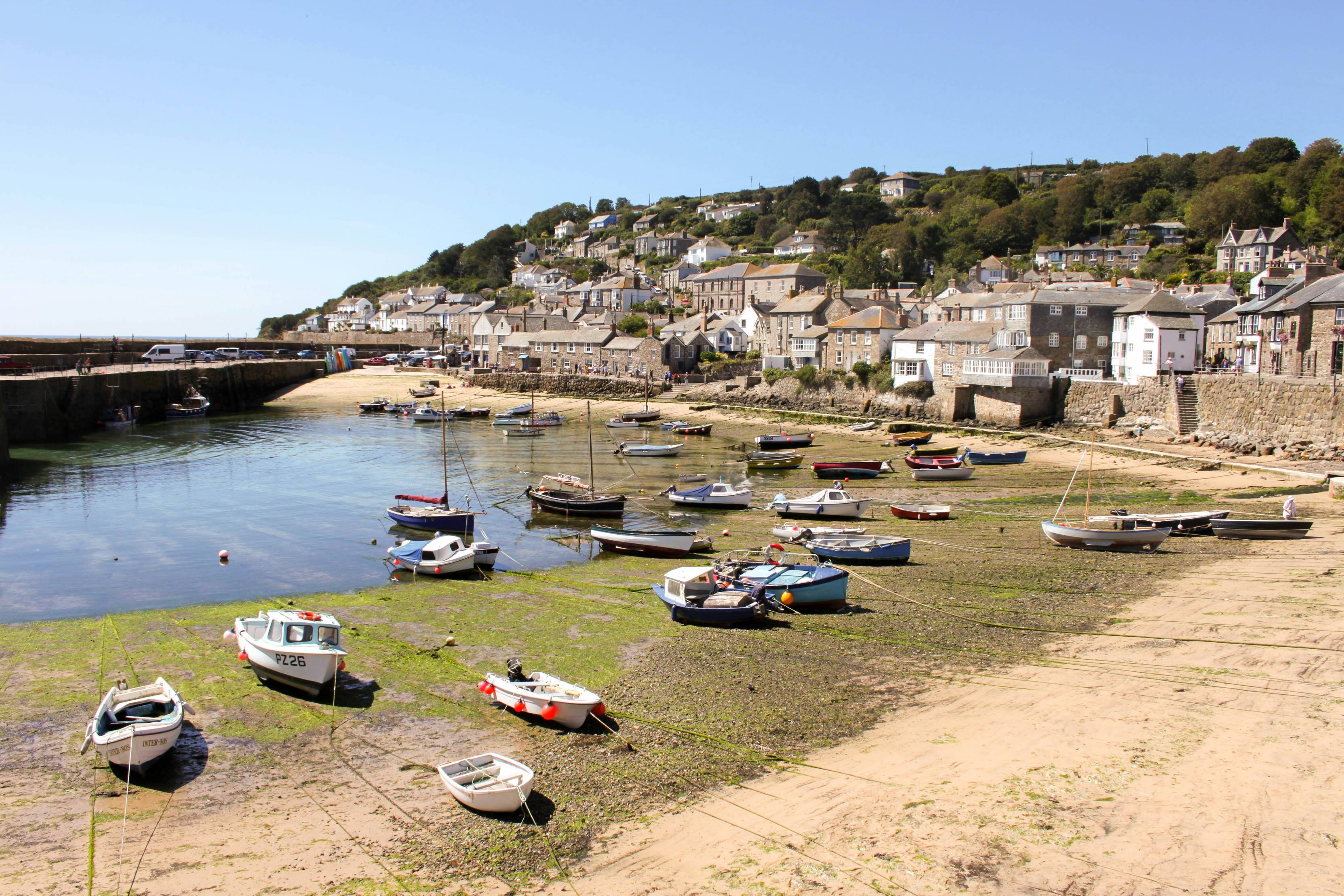 boats on water near buildings during daytime